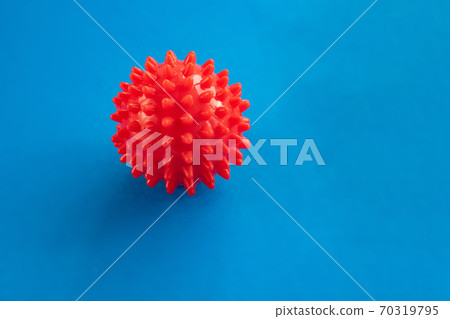 model of Coronavirus disease COVID-19 on blue model of Coronavirus disease COVID-19 on blue 70319795
