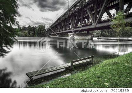 flood of the Ticino river in a cloudy day flood of the Ticino river in a cloudy day 70319889