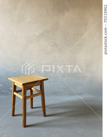 Wooden stool in room Wooden stool in room 70319902