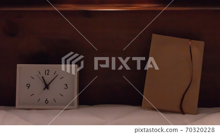 Reading in bed at night 70320228