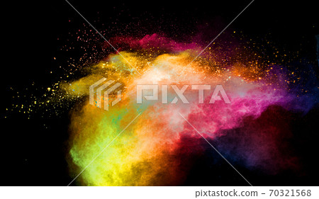 Multicolored powder explosion on black background.Colorful red yellow splash cloud on background. Multicolored powder explosion on black background.Colorful red yellow splash cloud on background. 70321568