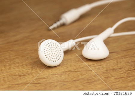 White earphone up 70321659