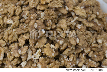 Fresh walnuts on sale at the farmers market Fresh walnuts on sale at the farmers market 70321886