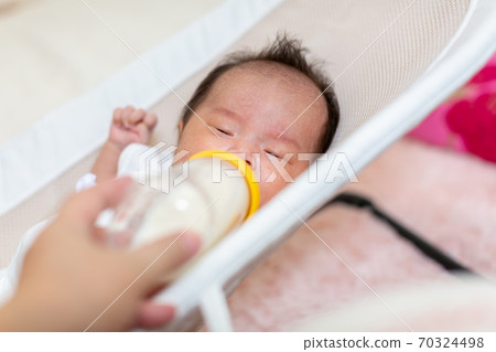 2 month old newborn baby drinking milk 2 month old newborn baby drinking milk 70324498