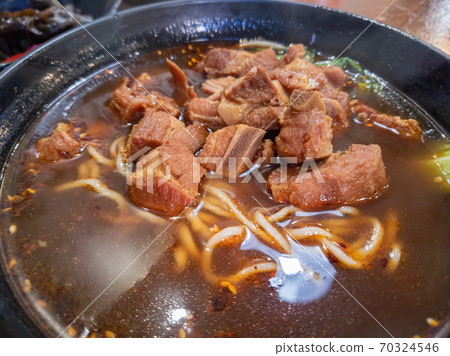 Close up shot of delicious hand pulled noodle with pork Close up shot of delicious hand pulled noodle with pork 70324546