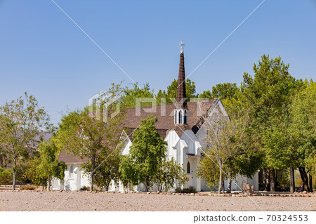 Sunny exterior view of the historical Candlelight Wedding Chapel Sunny exterior view of the historical Candlelight Wedding Chapel 70324553