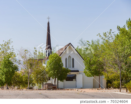 Sunny exterior view of the historical Candlelight Wedding Chapel Sunny exterior view of the historical Candlelight Wedding Chapel 70324604