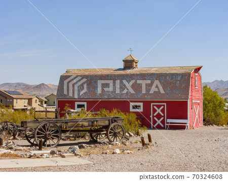 Sunny view of a beautiful red barn in Clark County Museum Sunny view of a beautiful red barn in Clark County Museum 70324608