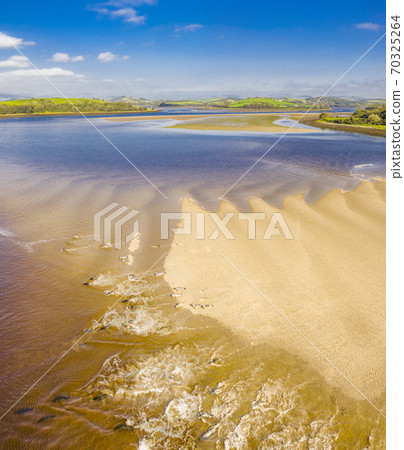 Aerial view of seal colony resting on sandbanks in County Donegal - Ireland 70325264