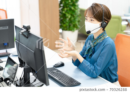 Young woman heading to the webcam 70326288