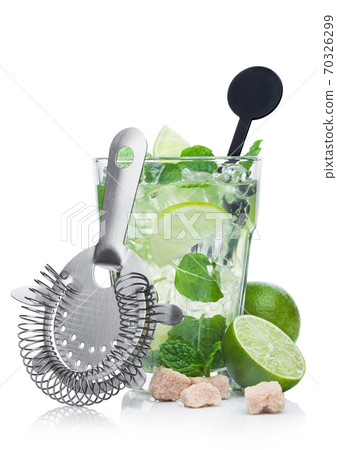 Luxury glass of Mojito summer alcoholic cocktail with ice cubes mint and lime on white Luxury glass of Mojito summer alcoholic cocktail with ice cubes mint and lime on white 70326299
