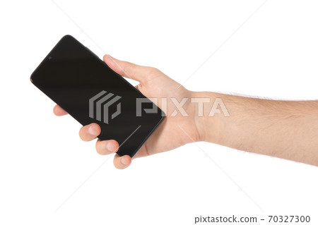 Man hand holding black smartphone 70327300