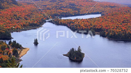 Panoramic view of Lake Monroe with autumn leaf color in Mont Tremblant National Park, Quebec 70328732