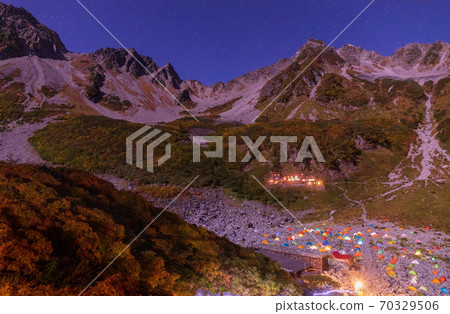 Karasawa Cirque and Hotaka Mountain Range Starry Sky in Autumn Colors Illuminated by Moonlight Karasawa Cirque and Hotaka Mountain Range Starry Sky in Autumn Colors Illuminated by Moonlight 70329506