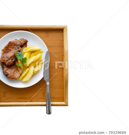 home cooking. meat and potatoes on a white plate. home cooking. meat and potatoes on a white plate. 70329689