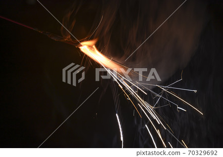 Hand-held fireworks 70329692