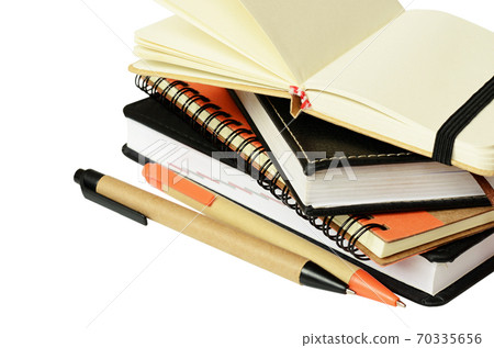 .Stack of notebooks and pens .Stack of notebooks and pens 70335656