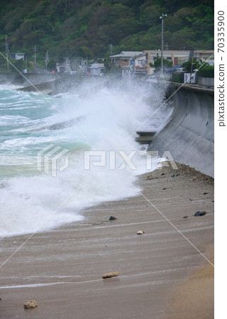 Amami Oshima Typhoon Rough waves crashing on the embankment 2 70335900