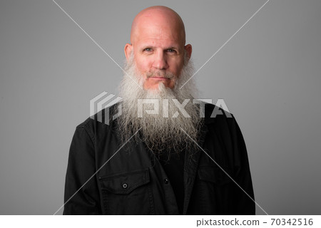 Face of mature handsome bald man with long beard Face of mature handsome bald man with long beard 70342516