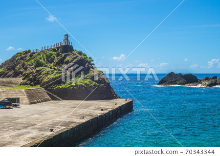 old lanyu lighthouse at Kaiyuan Harbor, lanyu, taiwan 70343344