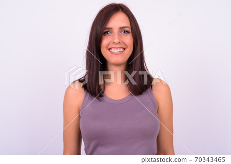 Face of happy young beautiful woman smiling Face of happy young beautiful woman smiling 70343465