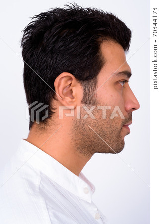 Closeup profile view of handsome Turkish man Closeup profile view of handsome Turkish man 70344173