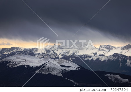 Majestic High mountains with winter snow 70347204