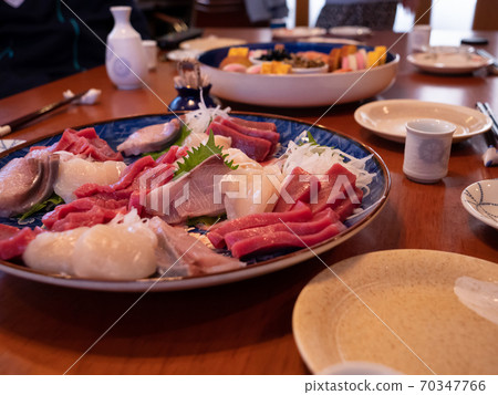 The table being set for a traditional new year's dinner in Japan The table being set for a traditional new year's dinner in Japan 70347766