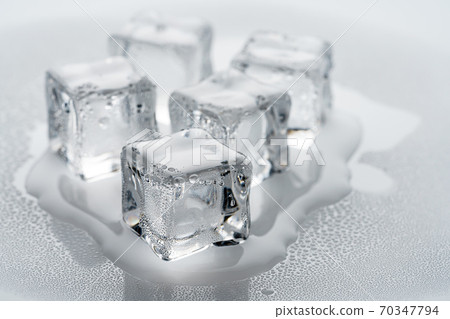 Square ice with water drops Square ice with water drops 70347794