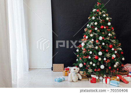 Christmas tree pine decor black background New Year holiday gifts 70350406