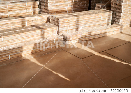 Panels of the parquet floor. Plywood boards on the industry. Preparation for the flooring of the parquet floor. Restoration of the floor in a restaurant or apartment. Panels of the parquet floor. Plywood boards on the industry. Preparation for the flooring of the parquet floor. Restoration of the floor in a restaurant or apartment. 70350493