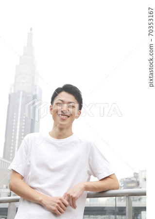 Laughing young man lifestyle image Laughing young man lifestyle image 70353167