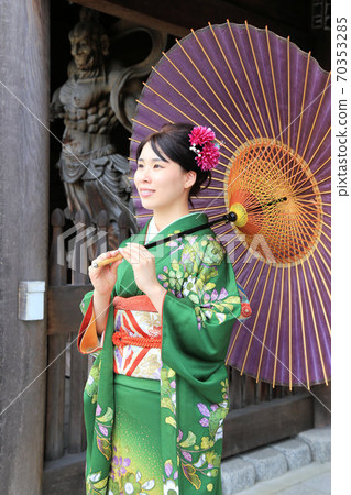 Adult furisode location shoot, Japanese woman in green kimono 70353285