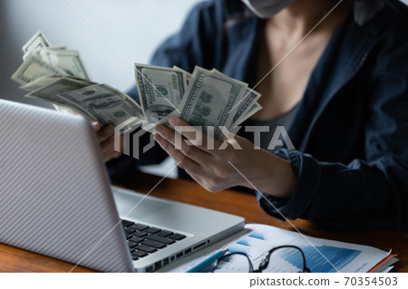 Hacker asia women stealing data success by using laptop. 70354503