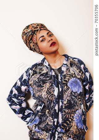 beauty bright african woman with creative make up, shawl on head like cubian closeup smiling beauty bright african woman with creative make up, shawl on head like cubian closeup smiling 70355706