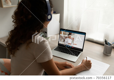 Female student study online on laptop at home Female student study online on laptop at home 70356117