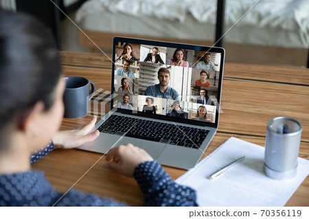 Female employee have webcam team online meeting Female employee have webcam team online meeting 70356119