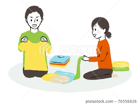 Family folding laundry 70356826