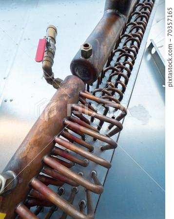 Brass heat radiator and industrial cooler detail 70357165