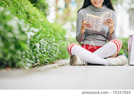 Reading captivating book Reading captivating book 70357893