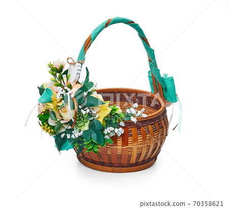 Easter basket from a flower arrangement on white background Easter basket from a flower arrangement on white background 70358621