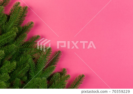 Top view of colorful background made of green fir tree branches. New year holiday concept with copy space Top view of colorful background made of green fir tree branches. New year holiday concept with copy space 70359229