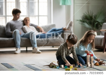 Caucasian family relax at home on weekend Caucasian family relax at home on weekend 70359995