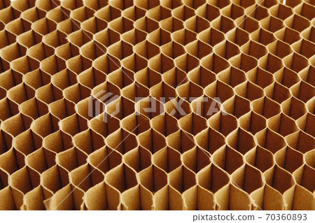 honeycomb cells of cardboard stiffening rib background 70360893