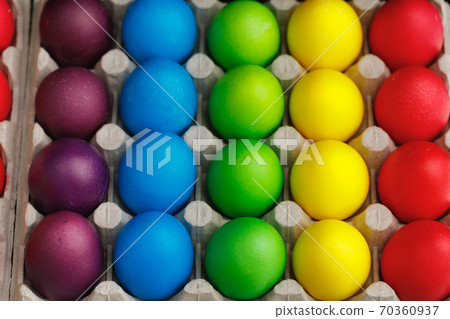 Easter festive multicolor eggs carton Easter festive multicolor eggs carton 70360937