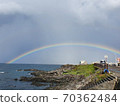 A rainbow over the sea of jeju island 70362484