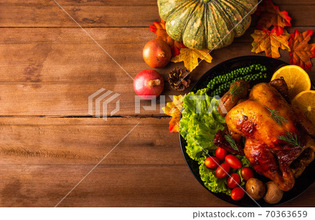 Thanksgiving roast turkey or chicken and vegetables Thanksgiving roast turkey or chicken and vegetables 70363659