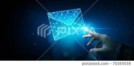 Businessman touching wireframe e-mail. Email marketing, newsletter, contact us concept 70365039