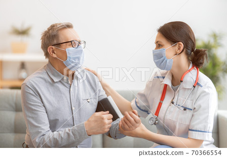 measuring blood pressure. measuring blood pressure. 70366554