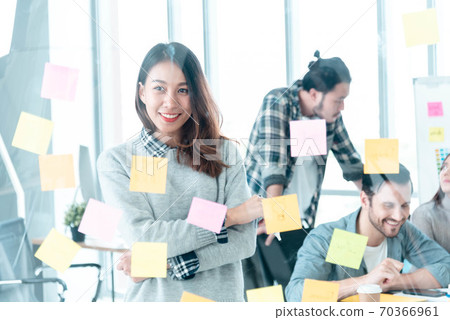 Brainstorming diversity creative design use post it sticky note  team meeting with startup teamwork 70366961